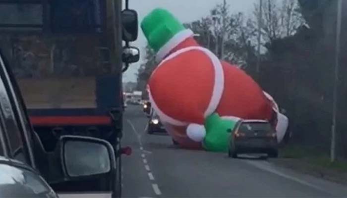 Featured image for Giant Inflatable Santa Causes Havok on Roads After Escaping From Nearby Garden