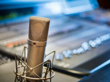 silver microphone near audio mixer